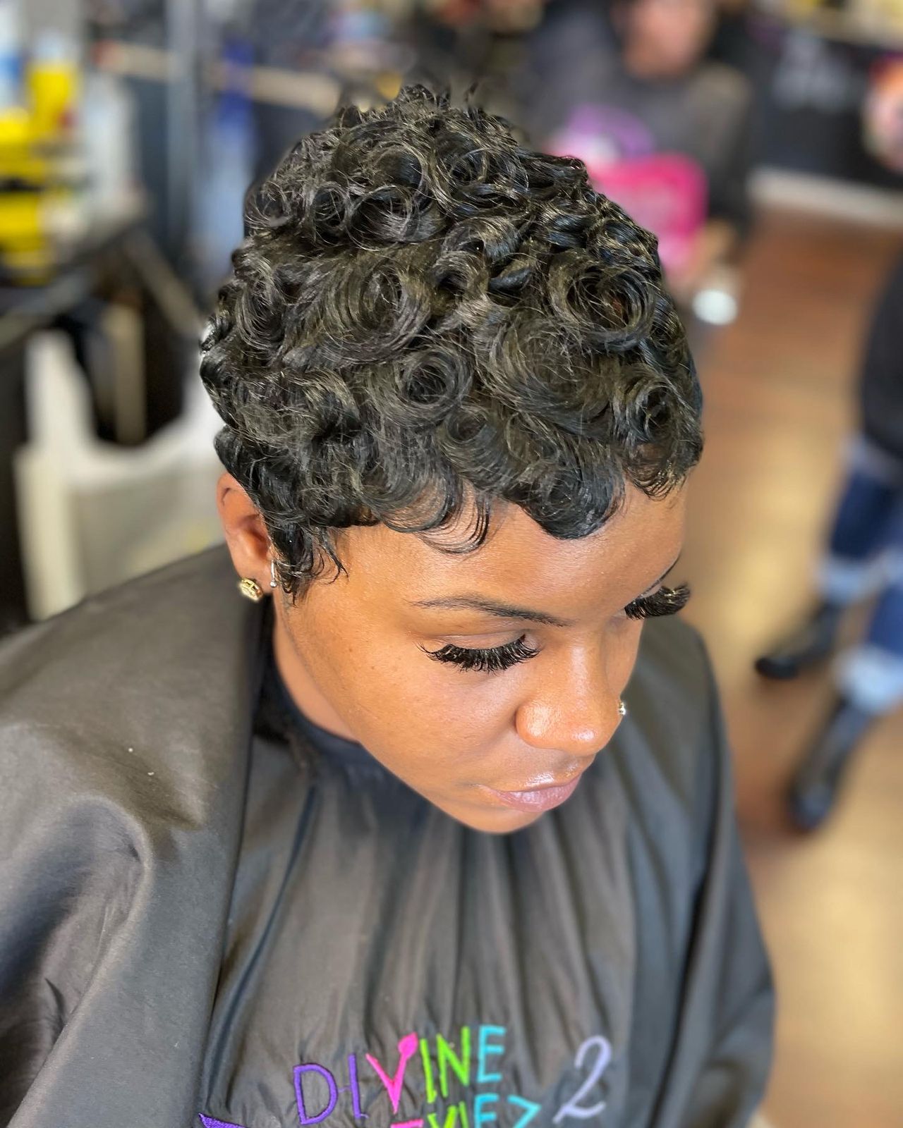 Glossy pin curls from above, fresh out of the chair